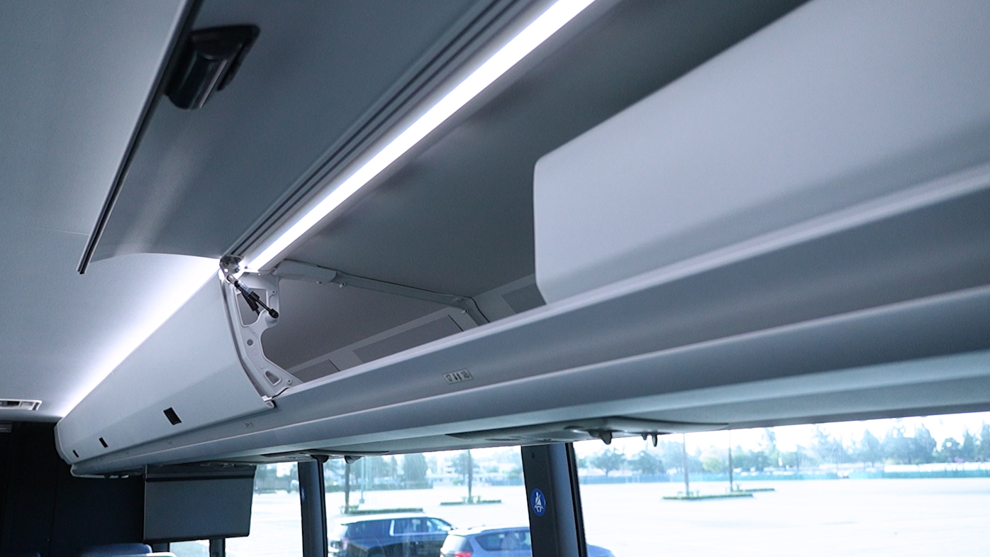 UniSky Express Prevost coach traveling on the road