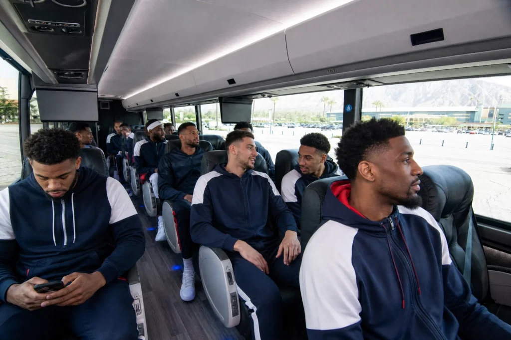 Professional basketball team traveling aboard a luxury coach